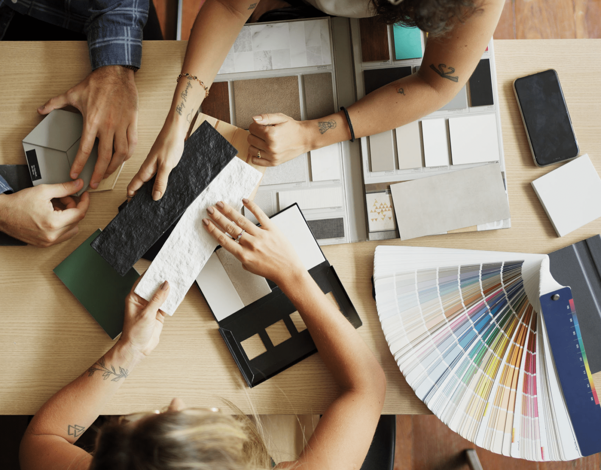 Designers choosing color samples and materials