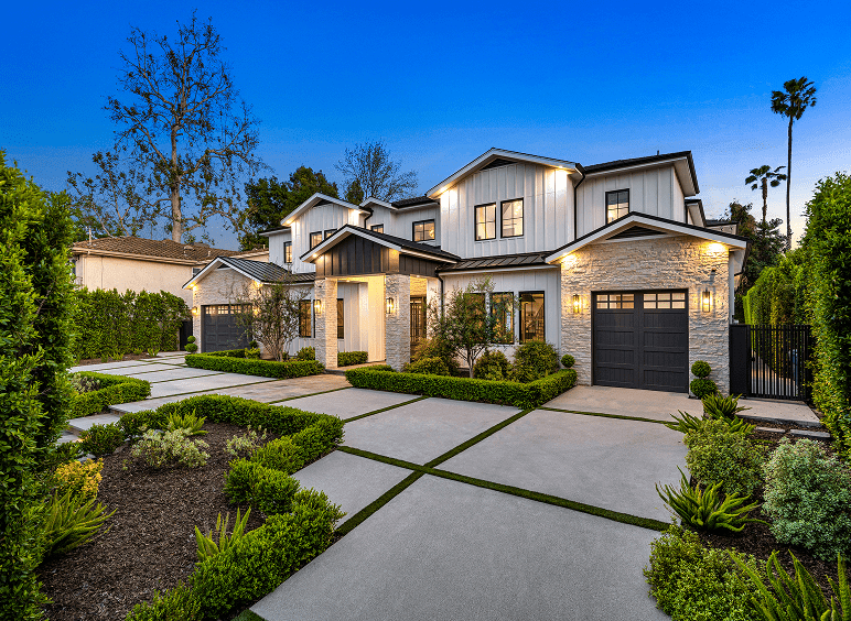 Stylish suburban house with evening lights.